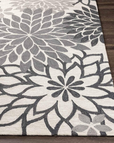 Contemporary hand tufted wool rug with monochrome floral detailing