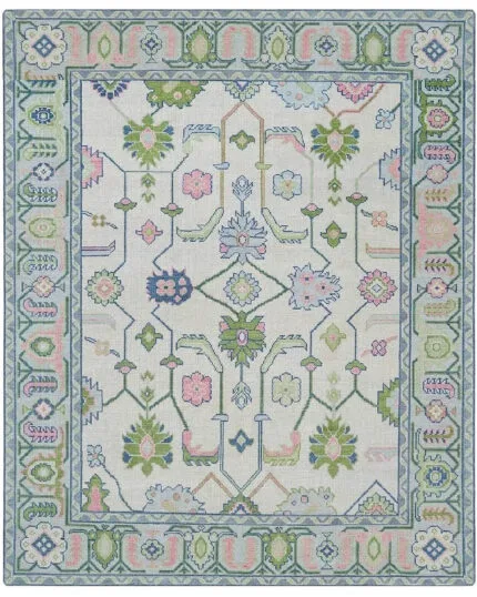Handmade wool area rug with geometric and floral pattern