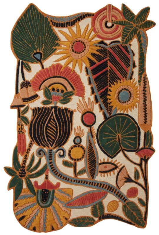 Hand tufted tropical botanical wool rug with jungle flowers, sunbursts, and bold leaves in yellow, red, green, and blue