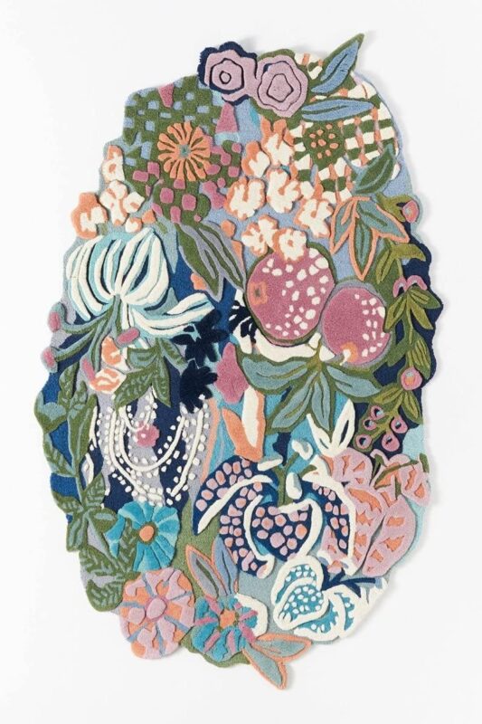 Hand tufted irregular botanical rug with pomegranates, berries, citrus blooms, and floral motifs in multicolor wool