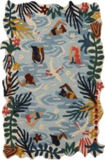 Hand tufted wool rug with tropical poolside design featuring swimmers, birds, waves, and vibrant leafy borders