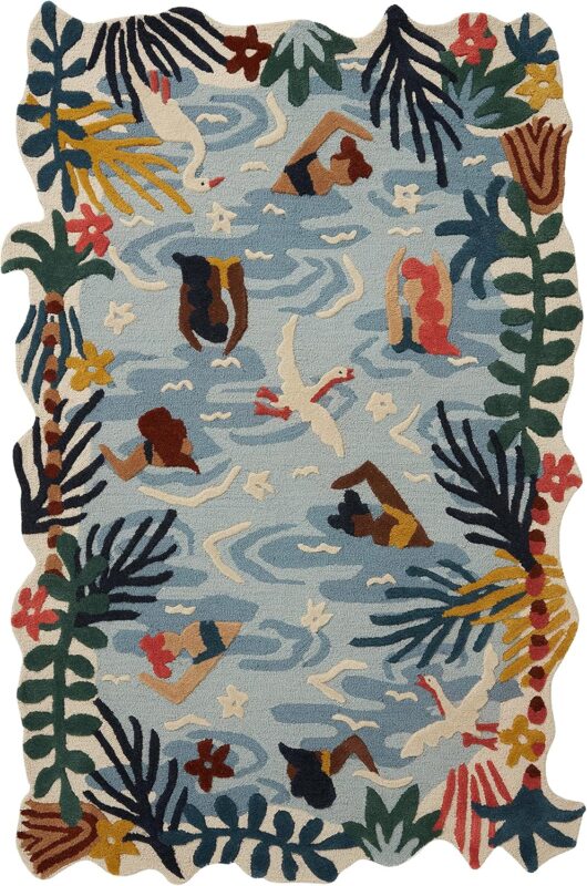 Hand tufted wool rug with tropical poolside design featuring swimmers, birds, waves, and vibrant leafy borders
