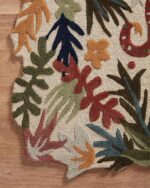 Hand tufted jungle theme rug with tigers, monkeys, tropical birds, snakes, and rainforest foliage in vivid colors