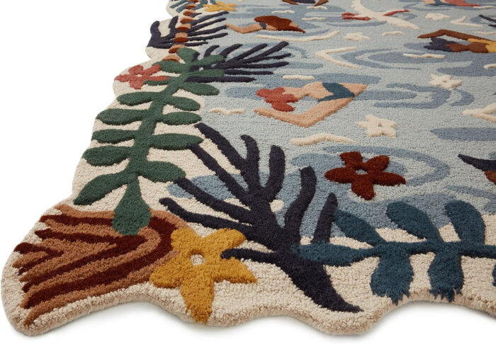 Tropical Poolside Wool Rug with Swimmers, Birds, Waves & Hand Tufted Design Hand tufted wool rug with tropical poolside design featuring swimmers, birds, waves, and vibrant leafy borders