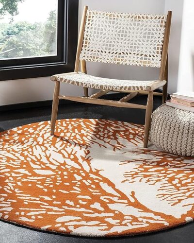 Round coral reef design rug in orange and cream – hand tufted wool carpet