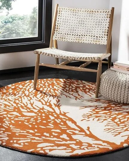 Round coral reef design rug in orange and cream – hand tufted wool carpet