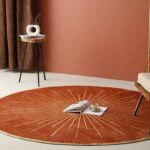 sunburst rug, round wool carpet, artistic modern rug, statement floor rug, rust round carpet