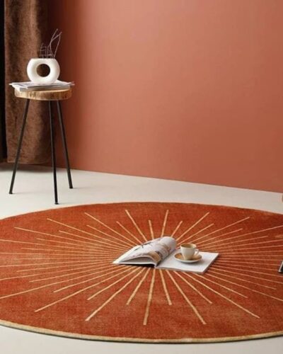 sunburst rug, round wool carpet, artistic modern rug, statement floor rug, rust round carpet