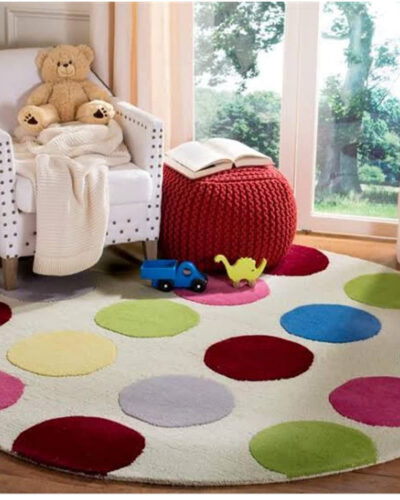 Colorful polka dot round kids rug for nursery and playroom decor