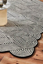 Black and white braided pattern rug with minimalist design – hand tufted wool carpet