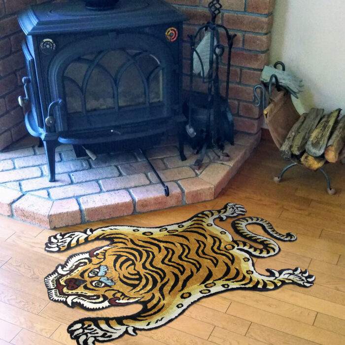 Tiger Shaped Rug – Tibetan Style Hand Tufted Carpet Tiger shaped rug with Tibetan art style and bold black stripes on golden brown wool