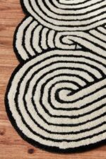 Black and white braided pattern rug with minimalist design – hand tufted wool carpet