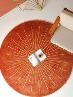 sunburst rug, round wool carpet, artistic modern rug, statement floor rug, rust round carpet