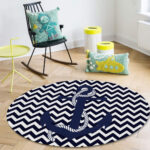 Navy blue round rug with white chevron pattern and anchor design, perfect for nautical-themed decor
