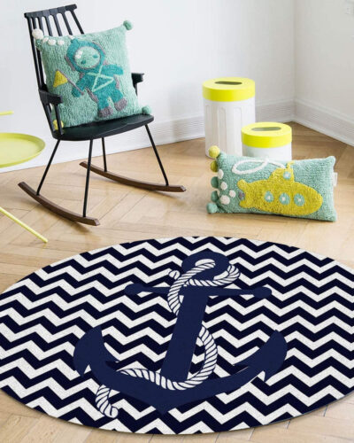 Navy blue round rug with white chevron pattern and anchor design, perfect for nautical-themed decor