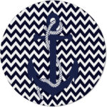 Navy blue round rug with white chevron pattern and anchor design, perfect for nautical-themed decor