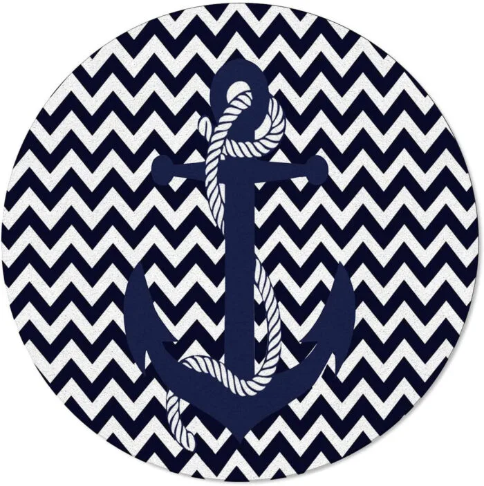Navy blue round rug with white chevron pattern and anchor design, perfect for nautical-themed decor