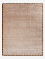 Neutral beige wool bedroom rug with minimalist border