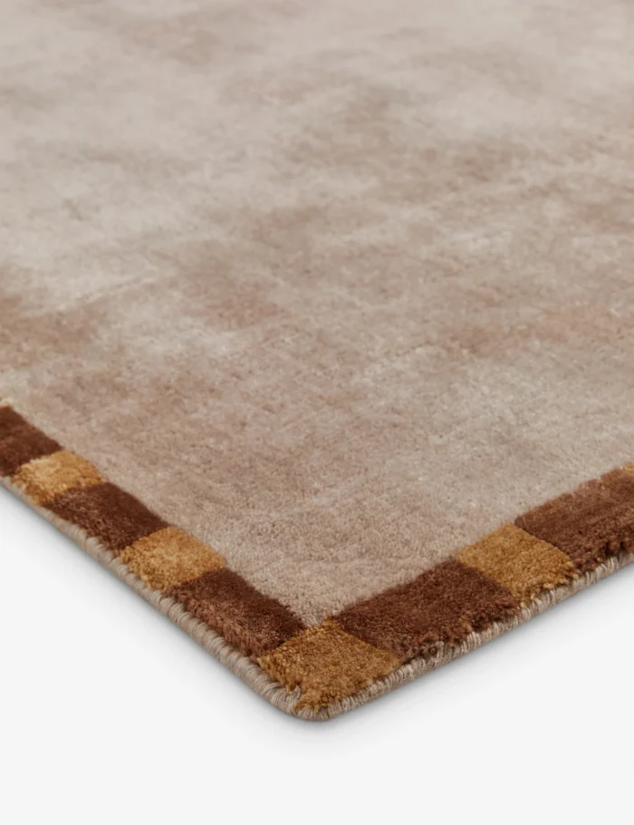 Soft neutral beige wool bedroom rug close view