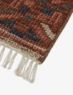 traditional wool hand knotted rug with border detailing