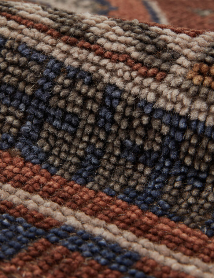 classic tribal patterned hand knotted area rug