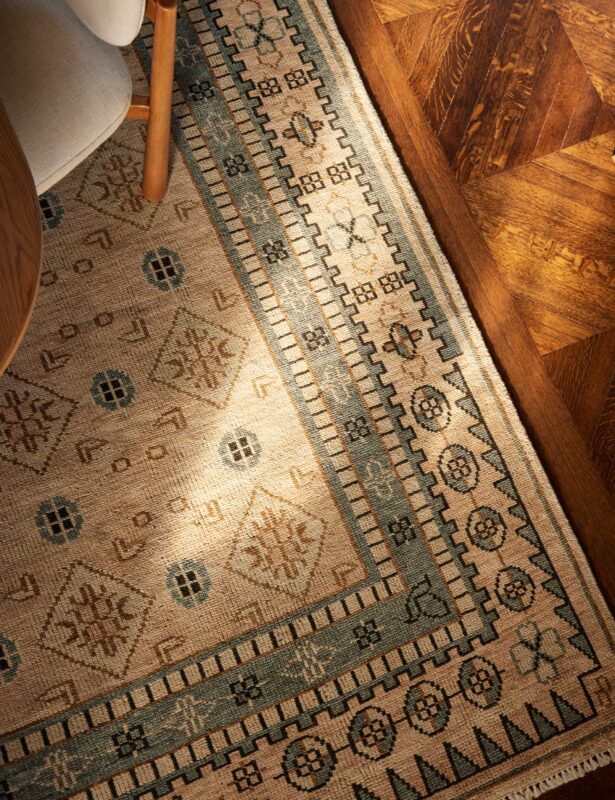Traditional wool rug hand knotted with fine craftsmanship
