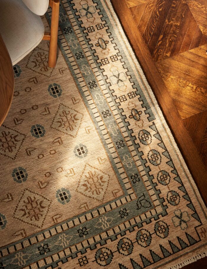 Traditional wool rug hand knotted with fine craftsmanship