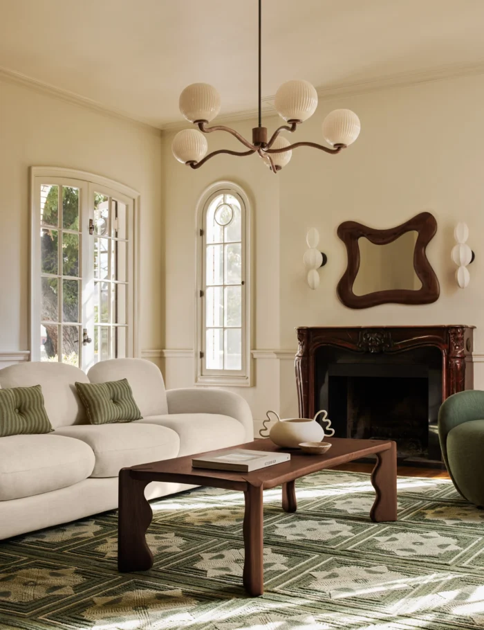 Hand knotted wool rug in green color with structured square motifs