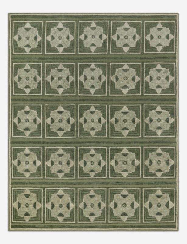Green geometric hand knotted rug with repeating medallion pattern