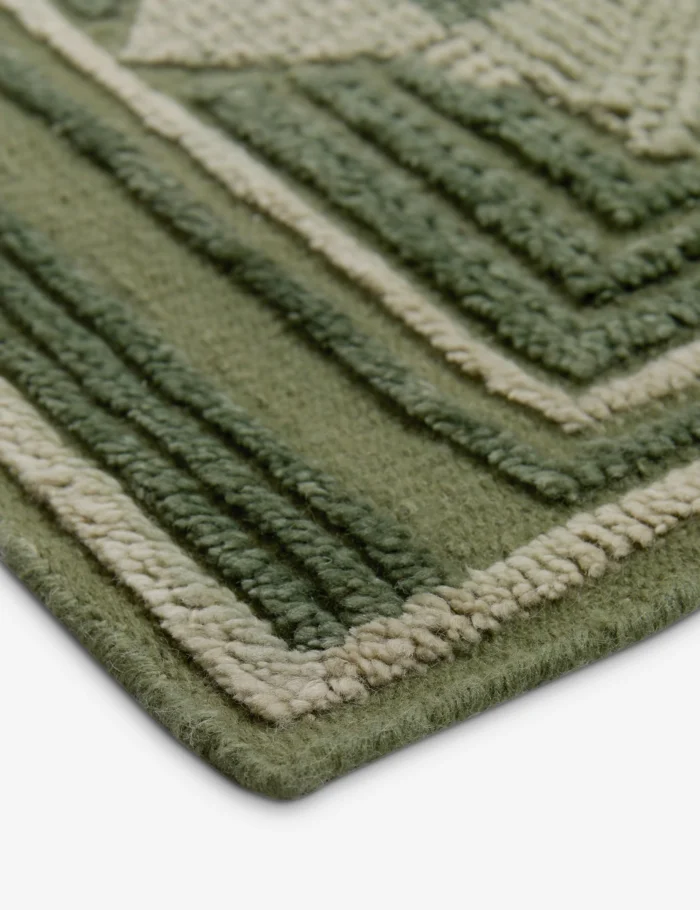 Green tone geometric rug with traditional hand knotted texture