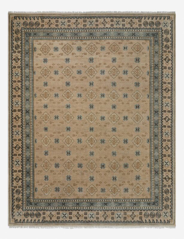 Hand knotted wool rug for bedroom in beige tribal design