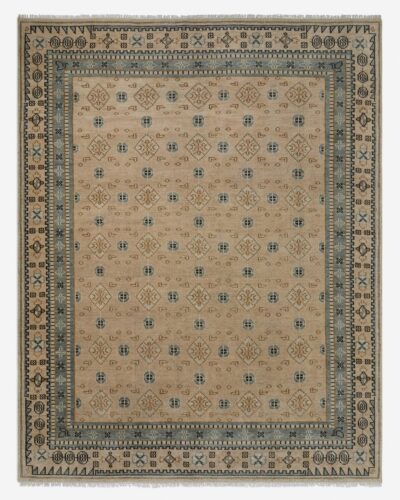 Hand knotted wool rug for bedroom in beige tribal design