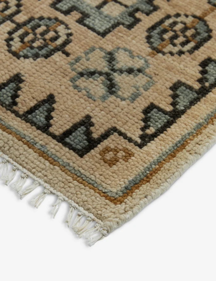 Beige hand knotted wool area rug for modern interiors