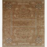 Hand knotted wool tribal rug with floral motifs