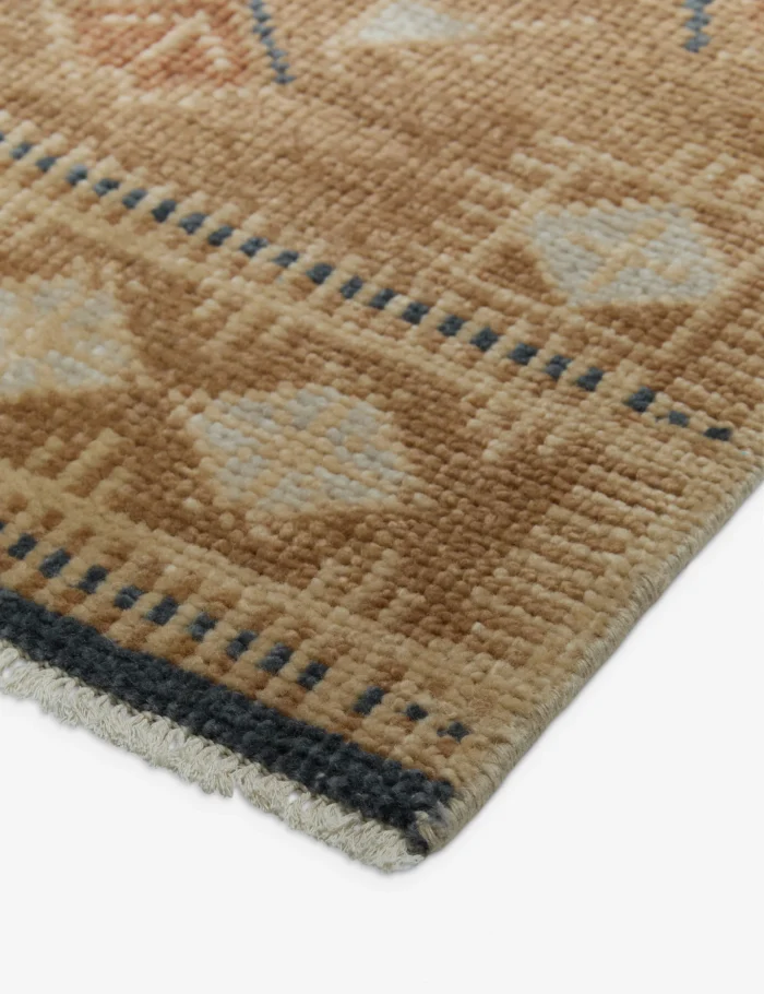 Hand knotted wool rug in earthy tones